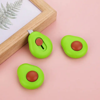 Avocado mini cutter - three units showing retractable blade detail