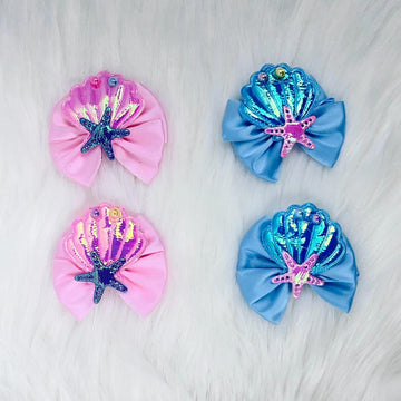 Stellar Shores: Embrace the Sea with Our Starry Seashell Hair Clip